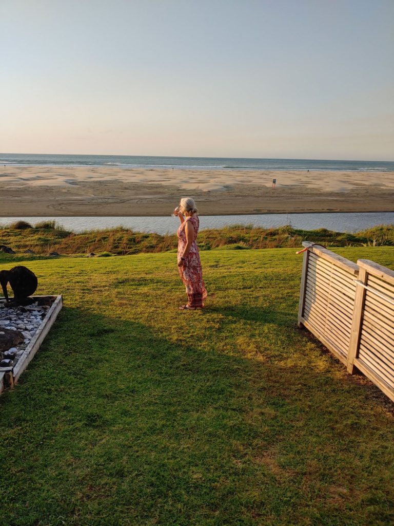 Robin looking out at an Ahipara sunset